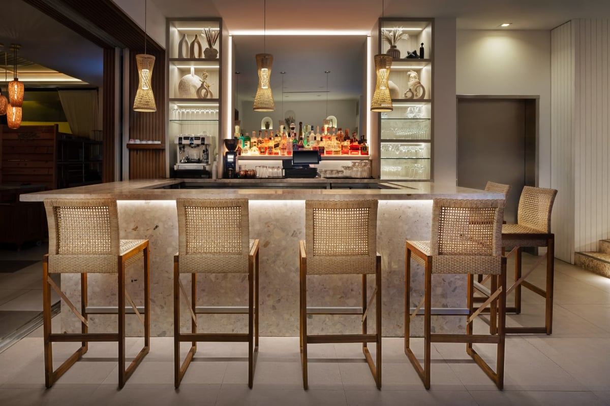 The café bar off the MB Hotel lobby, stools drawn up to the counter