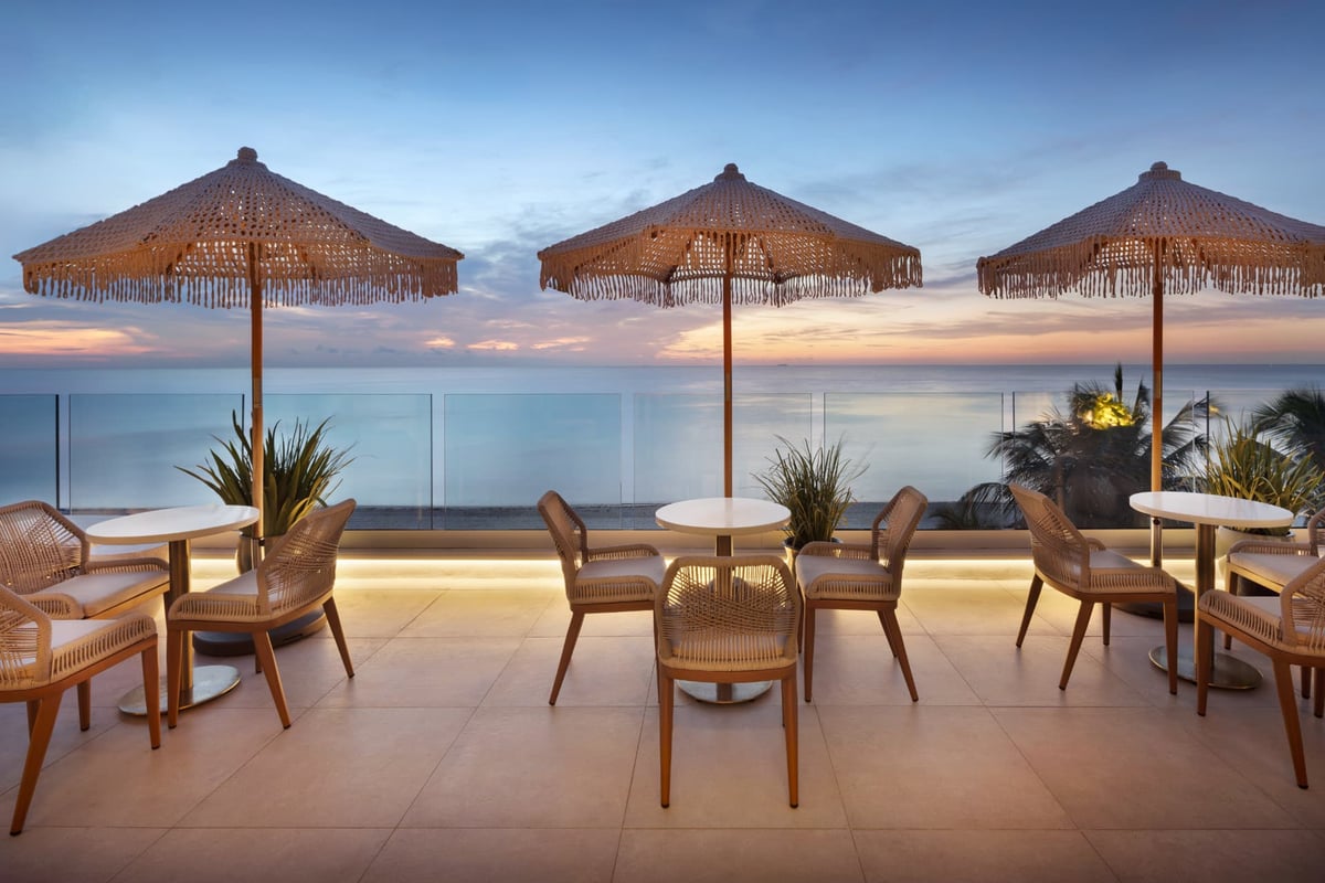 MB Hotel rooftop terrace above the beach, loungers facing the open Atlantic