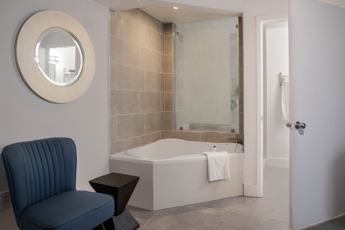 NK2 King with in-room jacuzzi tub set beside the window